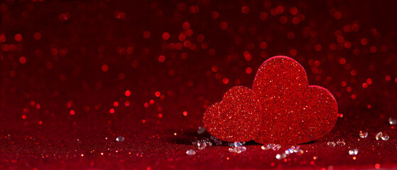 Red Love Hearts Decoration on Glitter Background. The Valentines Day concept perfect for holiday designs, greeting cards, and advertising.