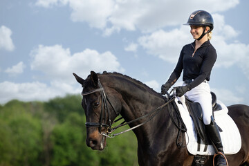 Dressage Equestrian riding black tobiano horse 