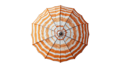 Top-down view of a vibrant orange and white striped beach umbrella providing shade on a sunny day at the shore