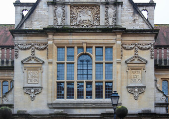 Beautiful stained glass window and antique stucco work on the building.