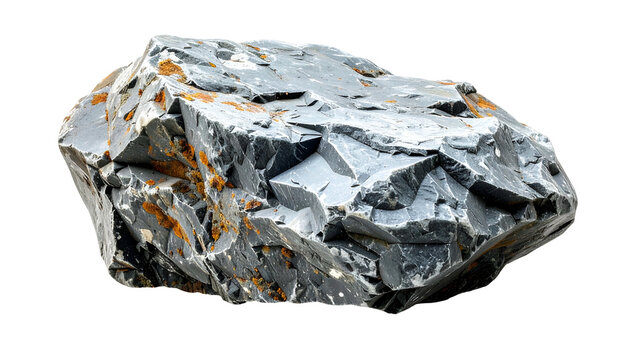 Isolated close-up of a roughly-hewn, jagged gray stone with orange lichen