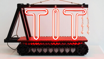 Neon Sign "TIT" on Miniature Tank Base with Pearl Necklaces