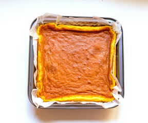 Baked New York style cheesecake in baking tray