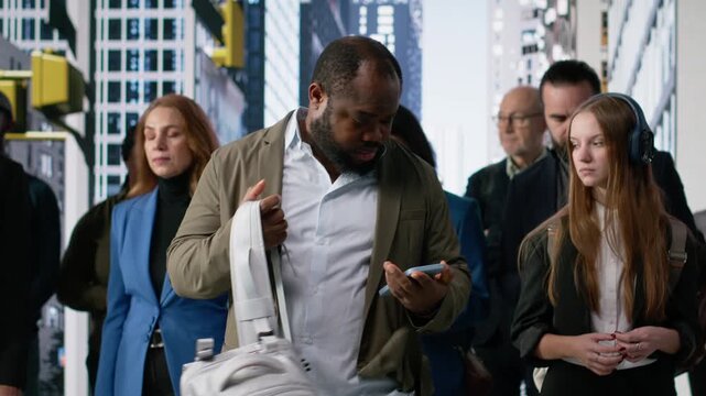 African american impatient businessman waiting to cross the street, busy everyday life of multicultural pedestrians. Diverse crowd of people on their morning commute. Camera B.