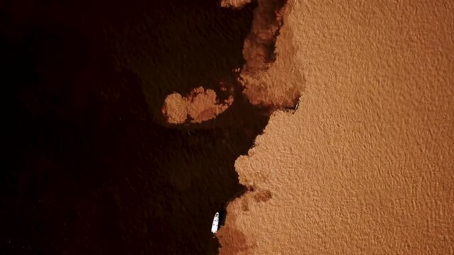 meeting of waters with a boat crossing the two rivers, Solimoes and Rio Negro in amazon brazil. High quality 4k footage