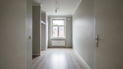 General view of an empty bedroom in a one-room apartment