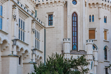 Gothic-revival castle facade with arched windows and turrets