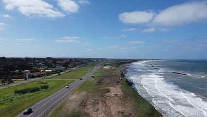 Cliff and beach with drone