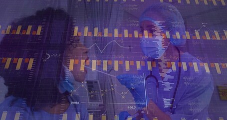 Examining provider in scrubs with stethoscope attending patient in gown, mask, clinic data charts