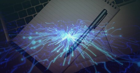 Showing spiral notebook with metal pen on desk featuring laptop keys, phone edge, blue AI overlay