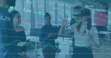 Reaching woman wearing light top dark skirt using VR headset in office, stock overlay, copy space