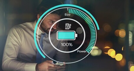 Holding smartphone, man in white shirt and blue tie leaning near office window, showing battery HUD