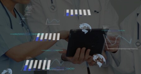 Reviewing medical team studying black tablet in clinic with stethoscopes, blue scrub and lab coats