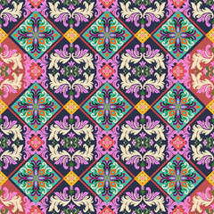 Seamless ornamental floral pattern featuring decorative vintage motifs, symmetrical design, and colorful elements. Ideal for fabric, textile, wallpaper, wrapping paper,