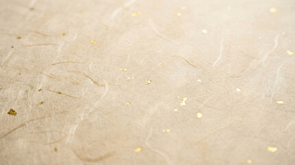 Korean traditional handmade paper Hanji texture background with gold flakes representing luxury and culture