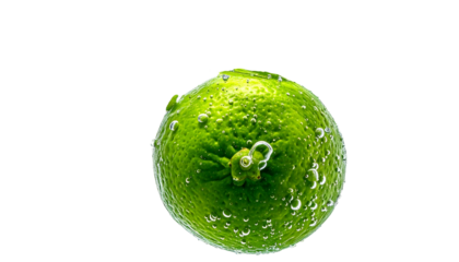 A vibrant, isolated lime with droplets, against a black background, capturing freshness and texture. Bubbles enhance the citrus fruit?s appearance
