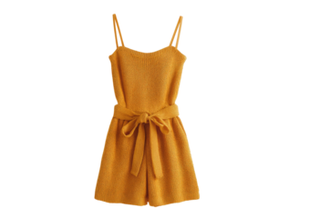 Mustard playsuit with tie waist and spaghetti straps on a black background