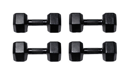 Four pairs of black, hexagonal dumbbell weights isolated on a black background
