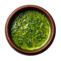Green sauce fills a small brown bowl