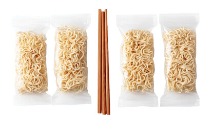 Four packets of dried noodles are separated by two chopsticks, overhead view