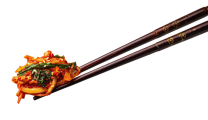 Kimchi held by chopsticks against black backdrop, flavorful spicy dish
