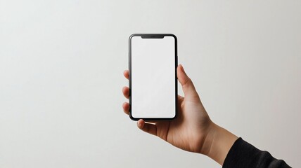 Hand Holding Blank Smartphone on Light Background for Mockup Use