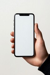 Hand Holding Blank Smartphone on Light Background for Mockup Use