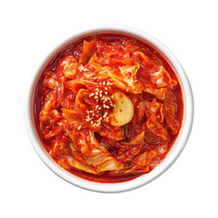 Top-down view spicy, fermented cabbage in a white bowl, sesame seed garnish