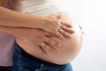 Pregnant woman big belly final weeks of pregnancy gender reveal