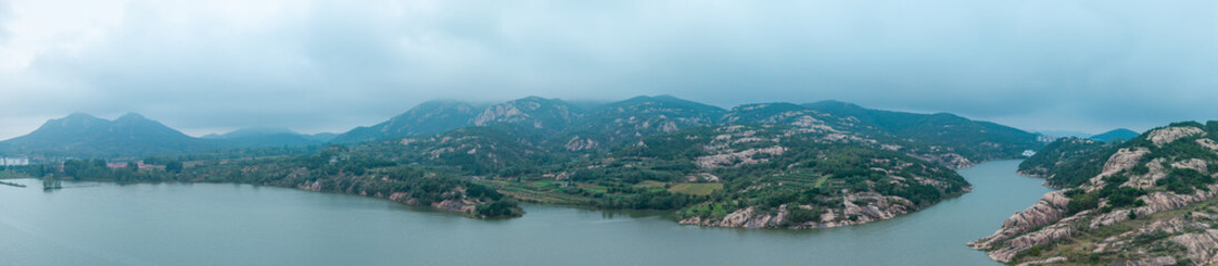 Fototapeta premium China Shandong Wulian Songyue Lake, cloudy and misty mountain scenery