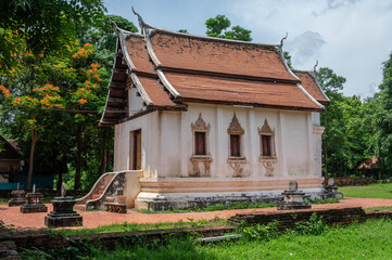 A small Viharn for enshrined the mock-up of Phra Fang Buddha statue in Wat Phra Fang temple in Uttaradit province of Thailand.