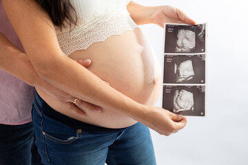 Pregnant woman big belly final weeks of pregnancy gender reveal