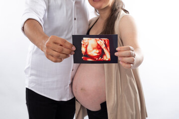 Pregnant woman big belly final weeks of pregnancy gender reveal