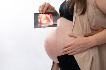 Pregnant woman big belly final weeks of pregnancy gender reveal