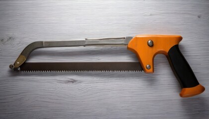 Hand Saw Tool on Wooden Surface.