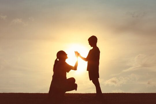 Mother giving daughter high five. Parent child relationship concept. Family support, childhood, trust togetherness, bonding, Love, motherhood concept	 - Powered by Adobe