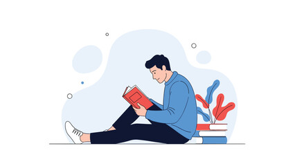 Young man sitting on the floor and leaning against a stack of books while engrossed in reading a red book in a peaceful setting.