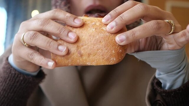 Enjoying stuffed pastry in a local cafe in the morning