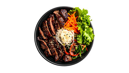 Overhead shot of a bowl with sliced steak, vegetables, and rice noodles