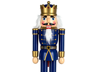 Close-up of a wooden soldier nutcracker with royal garb, golden crown, white hair