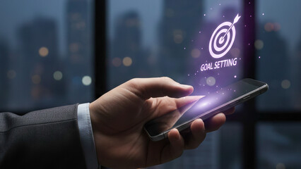 Financial planning concept high level goal planning over smartphone screen with virtual target hologram in dark office background