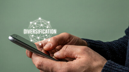 Financial high level planning concept diversification network graphic over mobile phone in male hand closeup digital investment strategy idea