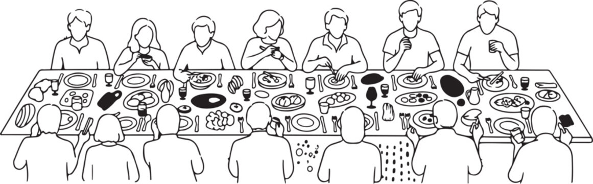 People sitting at a long table eating and socializing together