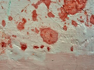 Abstract Texture of Old Peeling Red Paint on a Grungy Concrete Wall