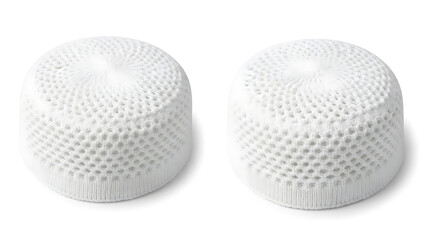 Two White Knitted Prayer Caps on White Background. Traditional Islamic Kufi Skullcaps. Muslim Headwear for Worship and Culture