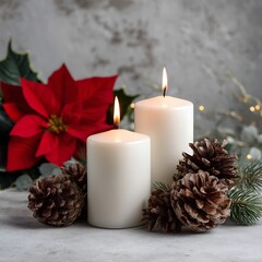 White Candles and Pine Cones Surrounded by Greenery and Red Flowers for Holidays