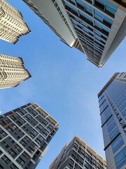 Low Angle View of Modern High-rise Apartment Buildings Against a Clear Blue Sky in Seoul
