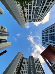 Low Angle View of Modern High-rise Apartment Buildings Against a Clear Blue Sky in Seoul
