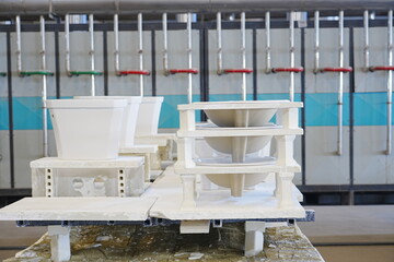 Workers in the bathroom toilet production workshop are working on the production line