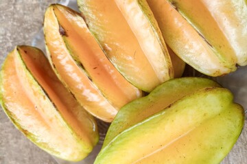 Close-up of fresh ripe yellow starfruit carambola texture